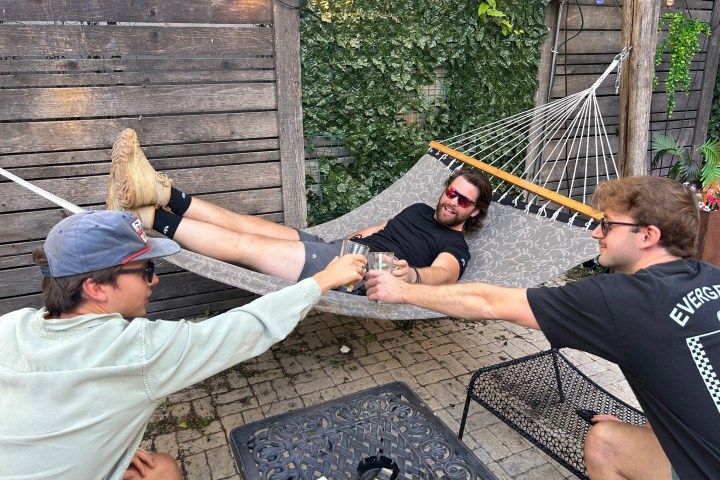 a group of people sitting at a zoo